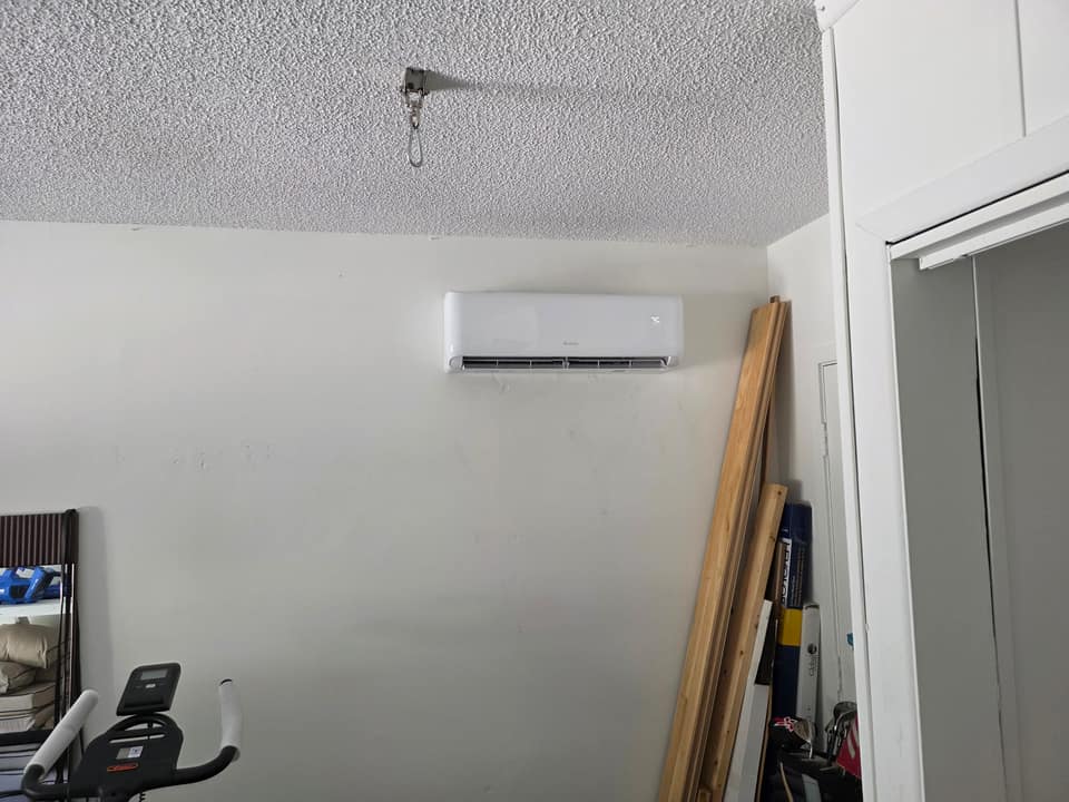 Ductless mini split head unit installed on an interior wall