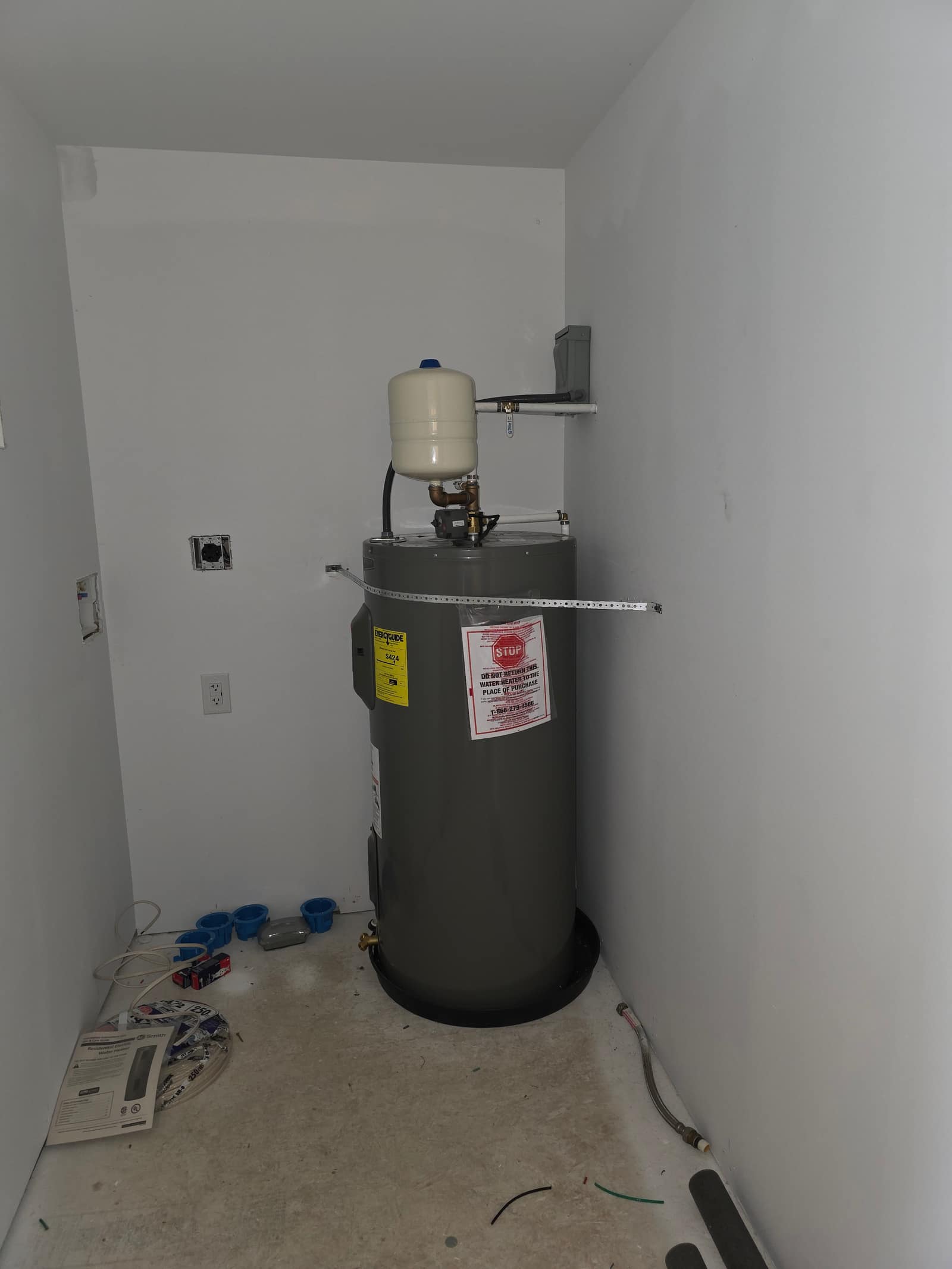 Water heater professionally installed in a utility closet